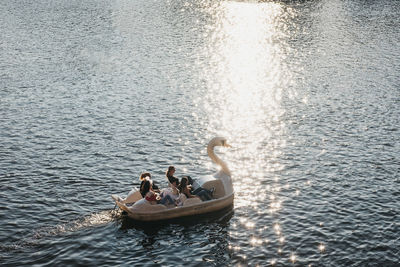 People on boat in lake