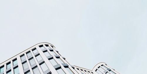 Low angle view of buildings against clear sky