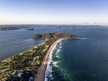 Drone view of palm beach and barrenjoey head and lighthouse, northern beaches, sydney, australia.