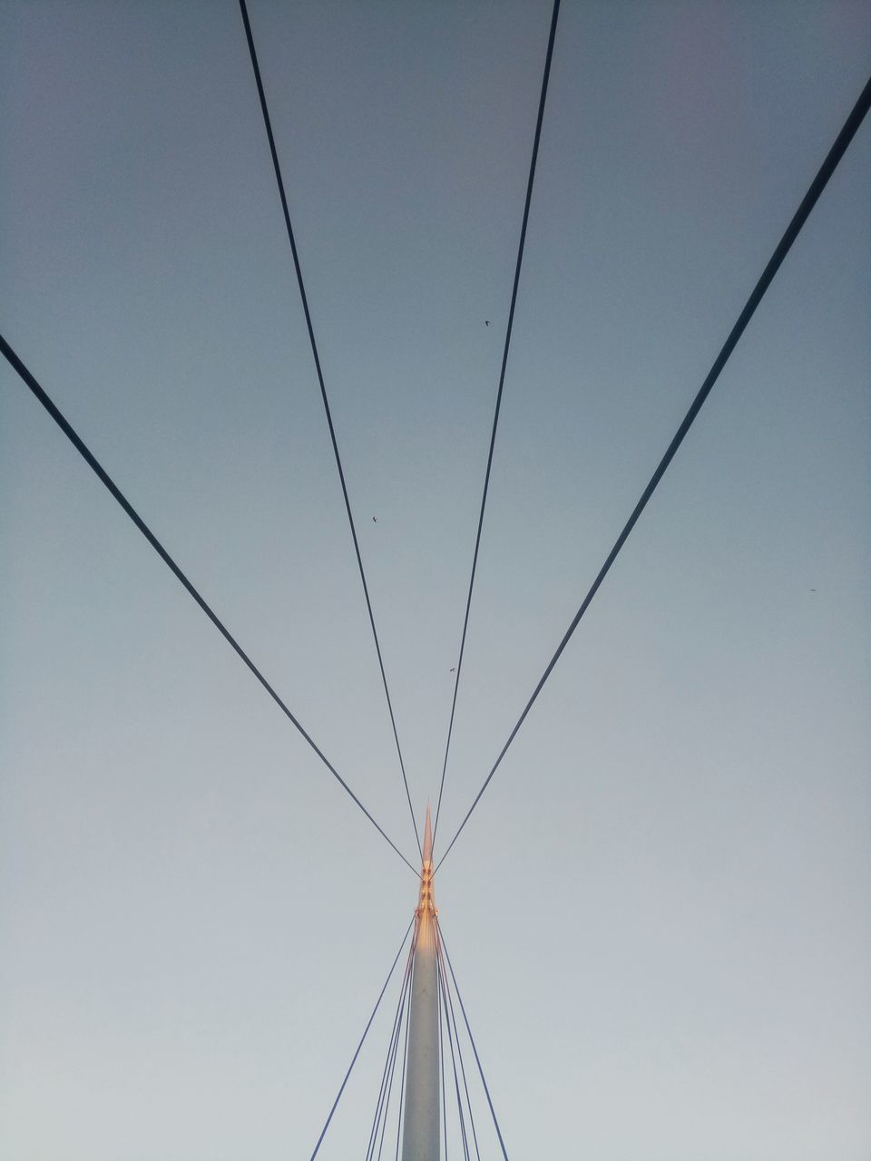 sky, no people, cable, low angle view, connection, clear sky, nature, day, built structure, architecture, technology, outdoors, transportation, copy space, electricity, fuel and power generation, power line, power supply, blue, mode of transportation, directly below