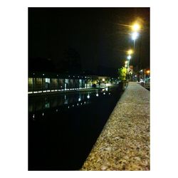 Illuminated street lights at night