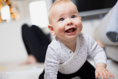 Portrait of cute girl playing with toy