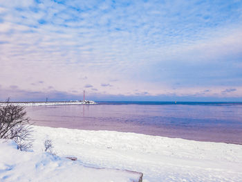 Scenic view of beach against sky