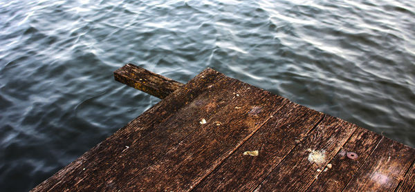 High angle view of pier corner over lake