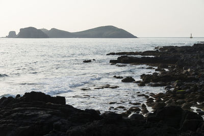 Scenic view of sea against clear sky