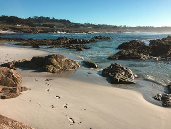 Scenic view of beach against sky