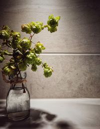 Flower vase on table