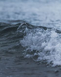 Close-up of waves splashing in sea