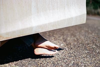 Low section of woman in car