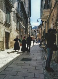 Full length of woman walking in city