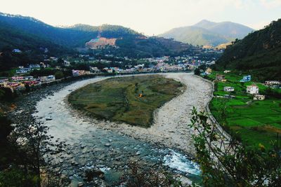 High angle view of buildings in city against sky