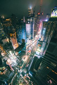 Aerial view of illuminated cityscape at night