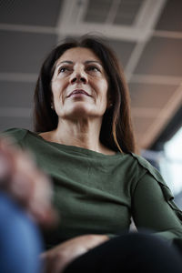 Low angle view of mature woman