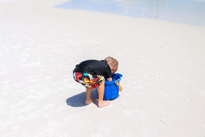 High angle view of boy on beach