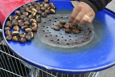 High angle view of person preparing food on table