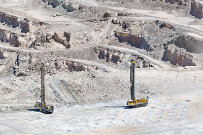 Blasthole drill in an open pit copper mine operation in chile