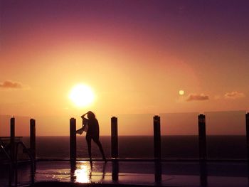 Scenic view of sea at sunset