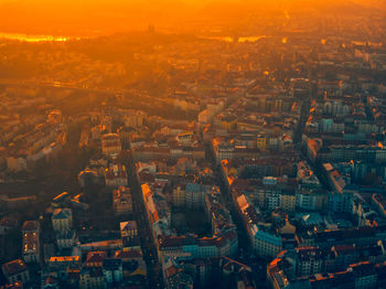 High angle view of city against sky during sunset