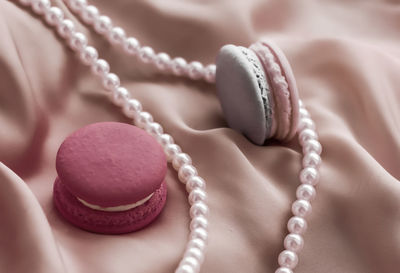 Close-up of wedding rings on table