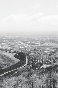 High angle view of winding road in city