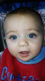 Close-up portrait of smiling boy