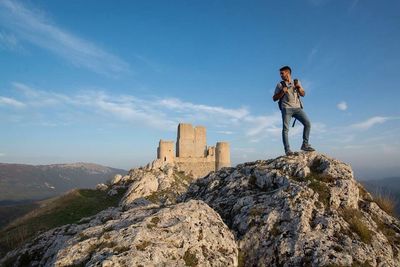 Man standing on cliff