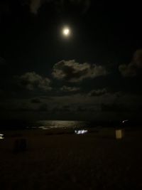 Scenic view of sea against sky at night