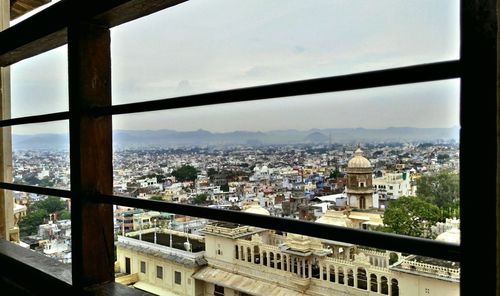 Cityscape seen through window