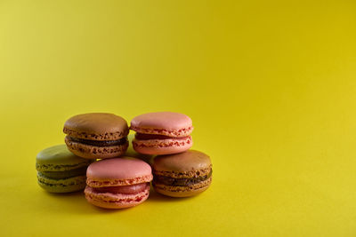 Close-up of dessert against yellow background