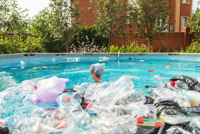 High angle view of person swimming in pool