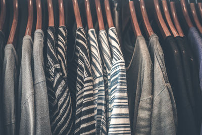 Close-up of clothes hanging on display at store