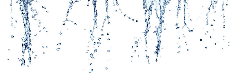 Close-up of water drops on glass against white background