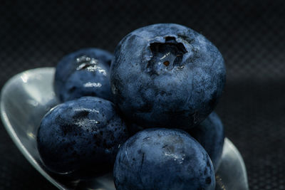 Close-up of blueberries in container