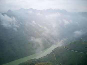 High angle view of mountains against sky