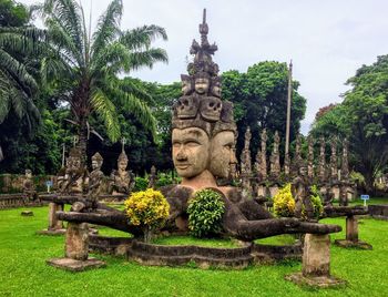 View of buddha statue against trees