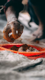 Close-up of person preparing food