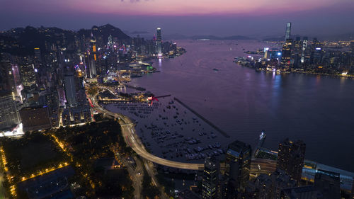 High angle view of illuminated city hong kong lit up at night