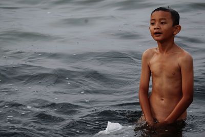 Boy looking at sea