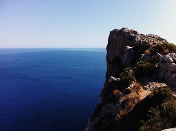 Scenic view of sea against blue sky