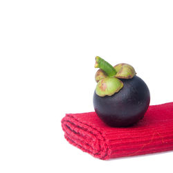 Close-up of apple against white background