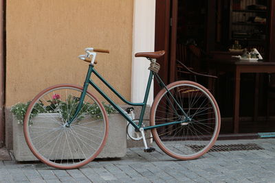 Bicycle against brick wall