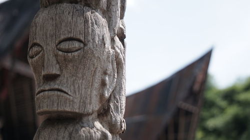 Close-up of statue against blurred background