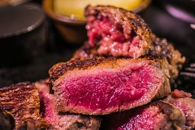 Close-up of meat on barbecue grill