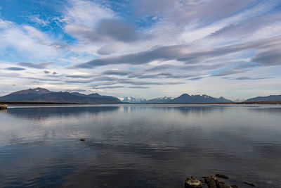 View of lake against cloudy sky