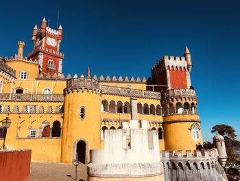 Palacio da pena a sintra low angle view against clear blue sky