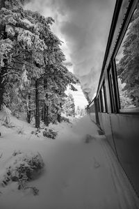 Scenic view of snow covered mountains against sky