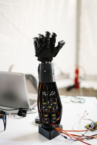 Close-up of robotic arm on table