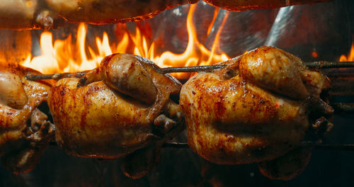 Close-up of meat on barbecue grill