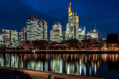 Reflection of illuminated buildings in water