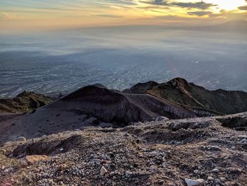 Scenic view of landscape against sky during sunset